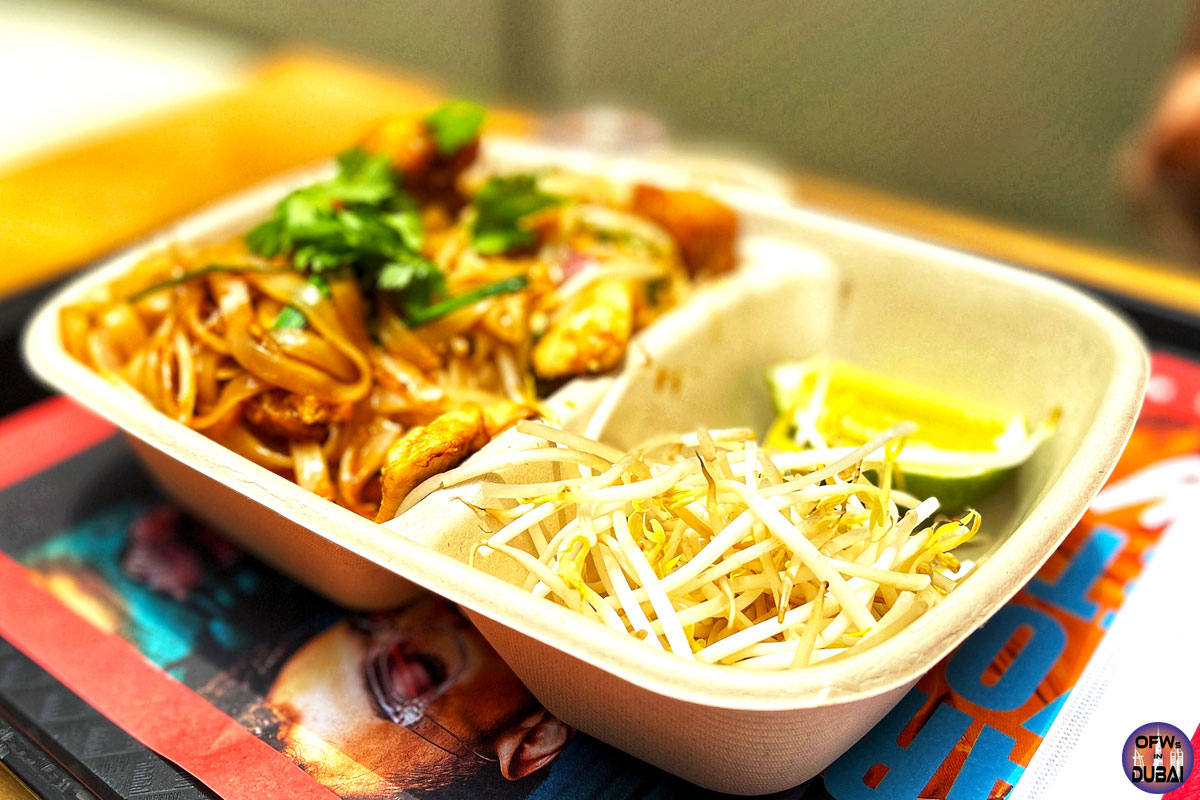 Chicken Pad Thai at Siam: A perfect balance of sweet, tangy, and spicy.